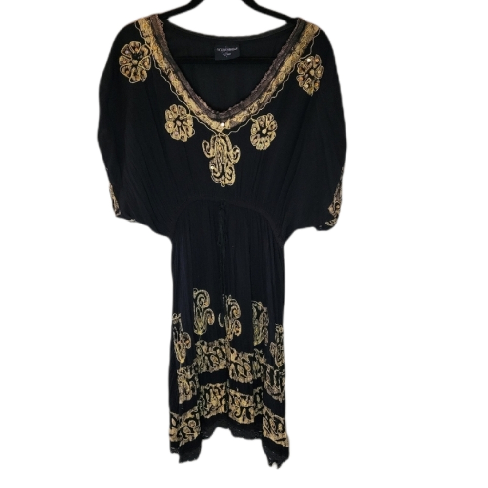 Ocean Breeze black and gold dress with floral prin